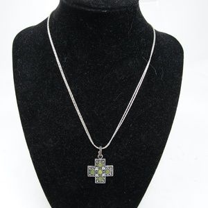 Vintage 1928 Necklace with green accent stones 18" total Length 7/8" cross size